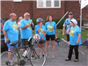 Mayor Patty Gregory in t-shirt speaking before Tour de Belleville with founders