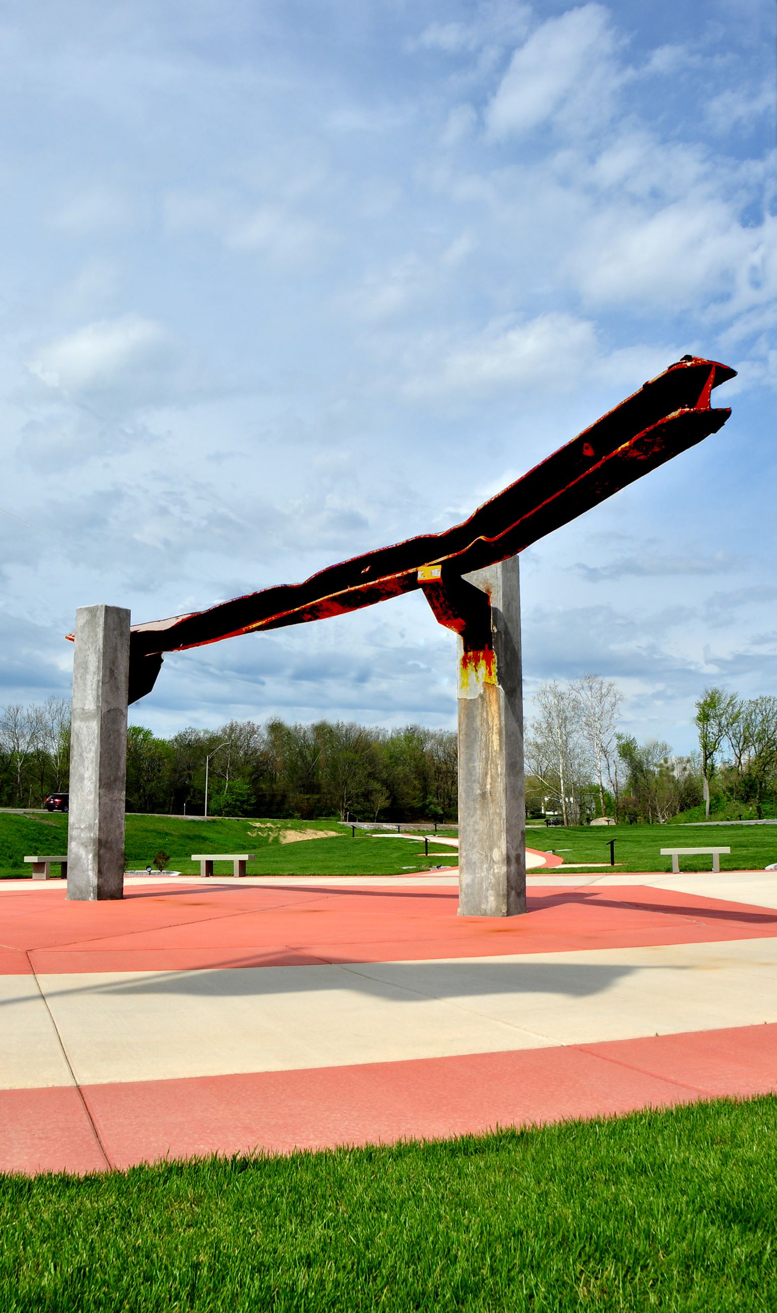 WTC Artifact Supported by Concrete Columns Representing the Twin Towers