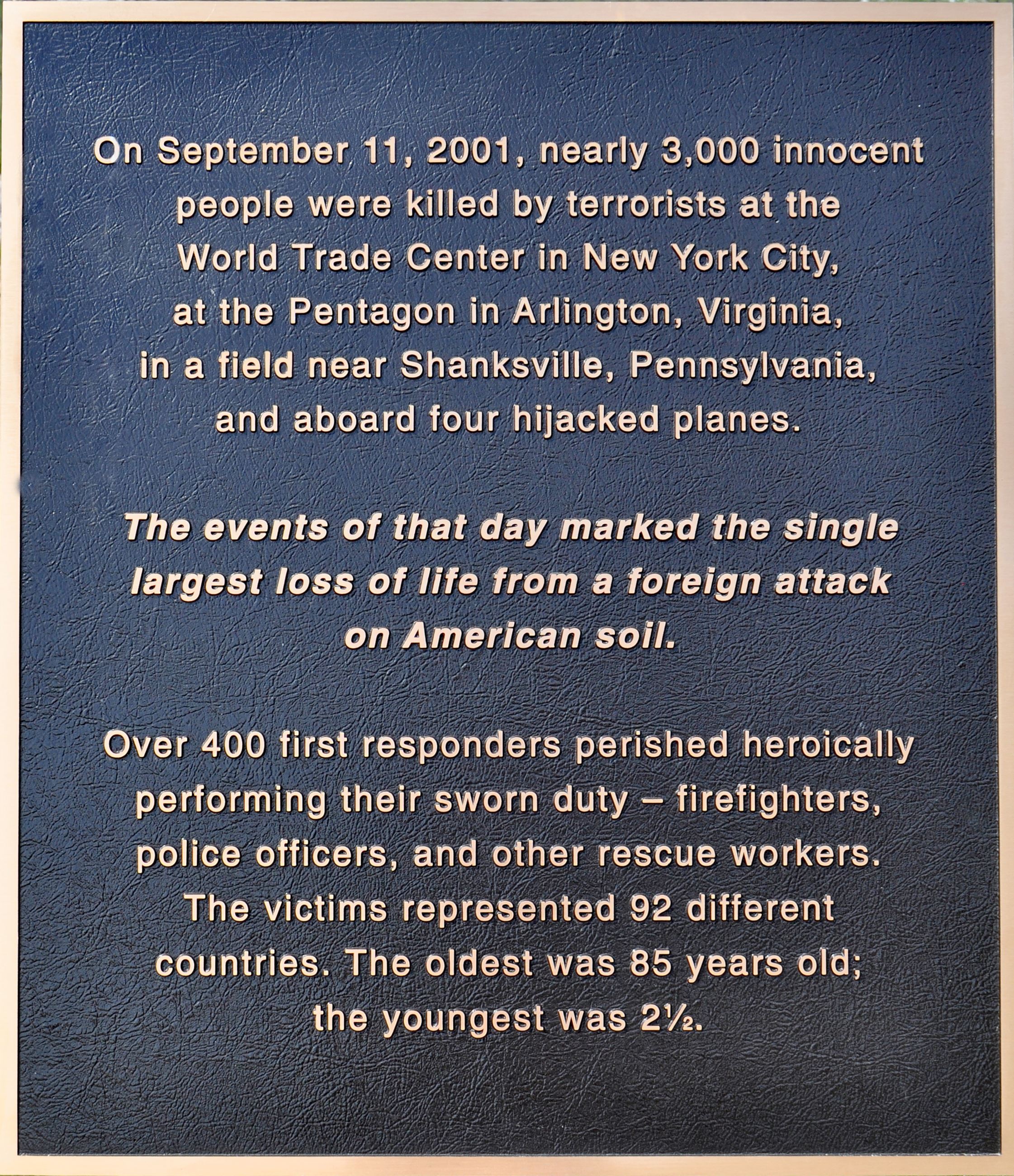 Bronze Plaque Along Walkway With Timeline of Events