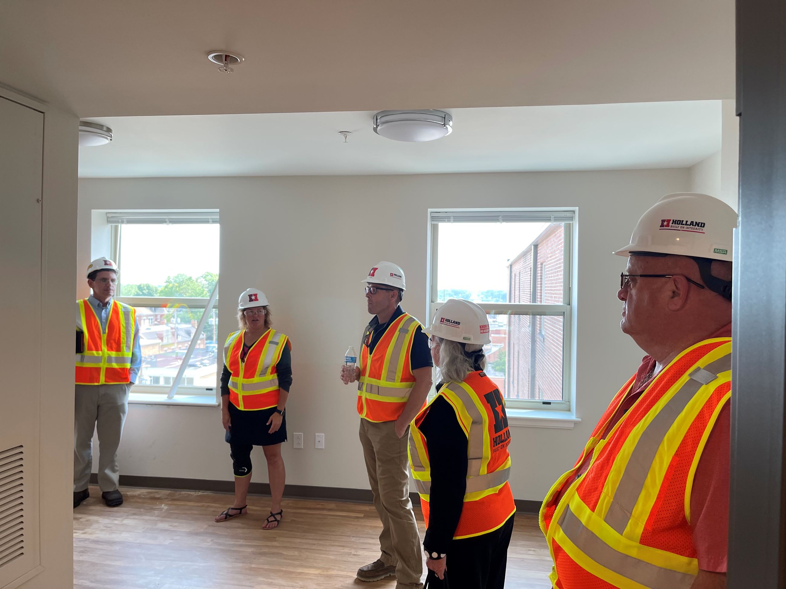 Mayor and City Staff Tour New Lofts on the Square